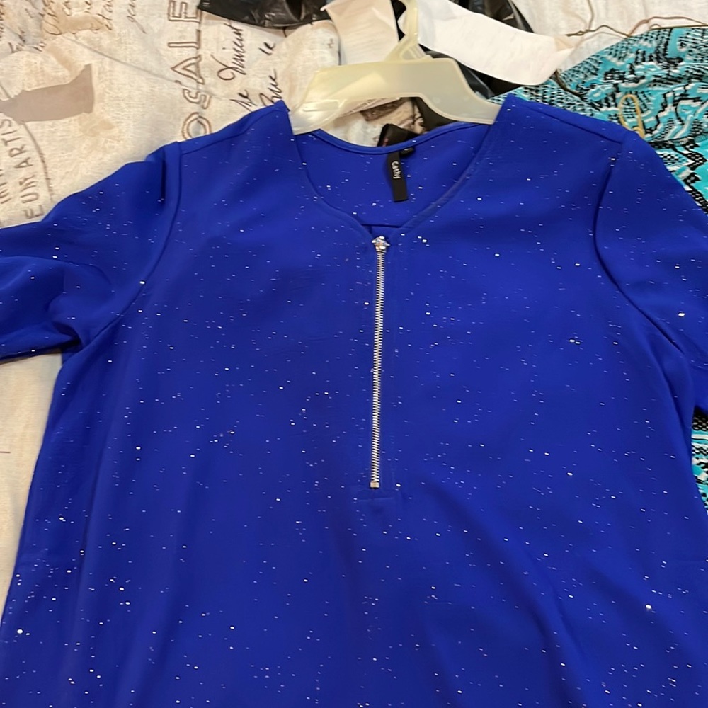Blue tunic with sparkle. Perfect for any occasion.